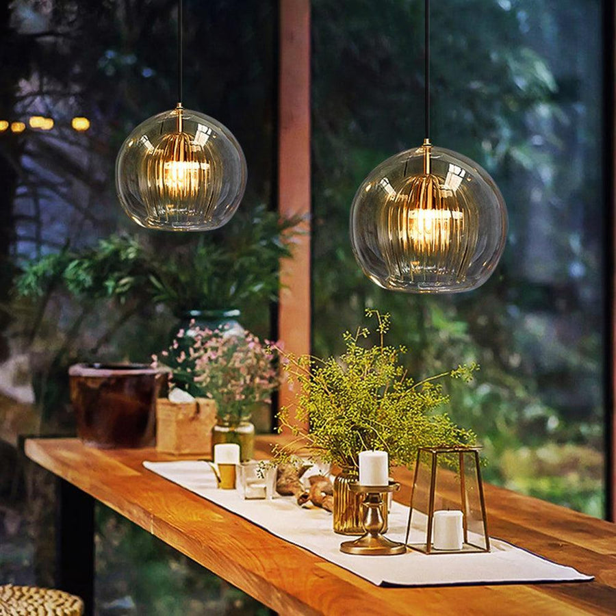 Althio Pendant Light Glass Globe Clear Amber in Amber