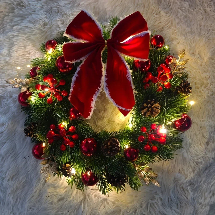 Christmas wreath with red velvet bow and baubles