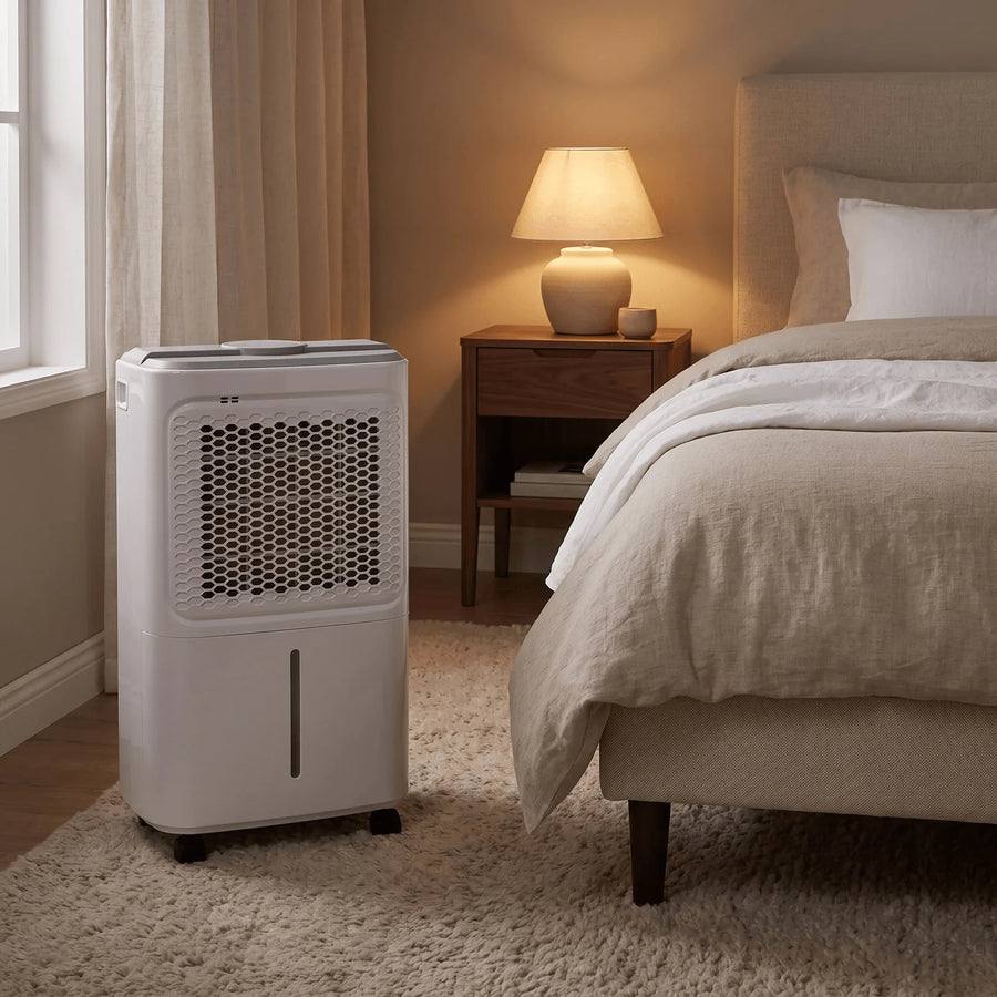 12L smart dehumidifier in the corner of a bedroom