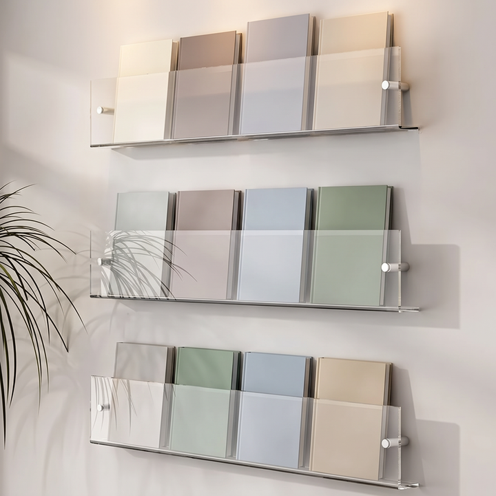 Clear acrylic wall shelves with magazines