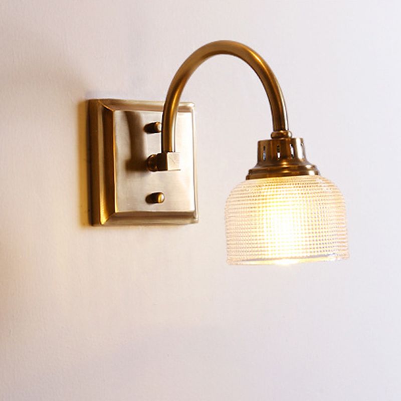 Antique brass prismatic glass vanity light