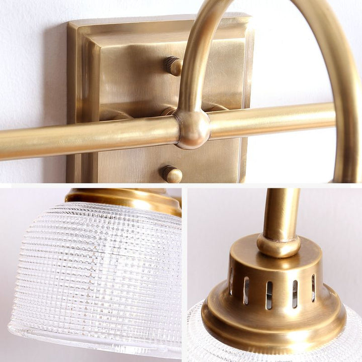 Antique brass prismatic glass vanity light