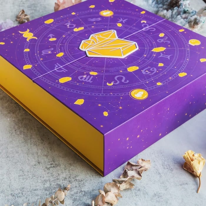 Crystal gemstone advent calendar in purple zodiac box