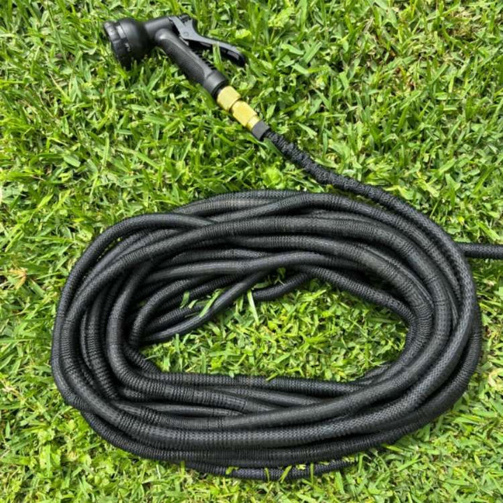 Expandable garden hose with spray gun