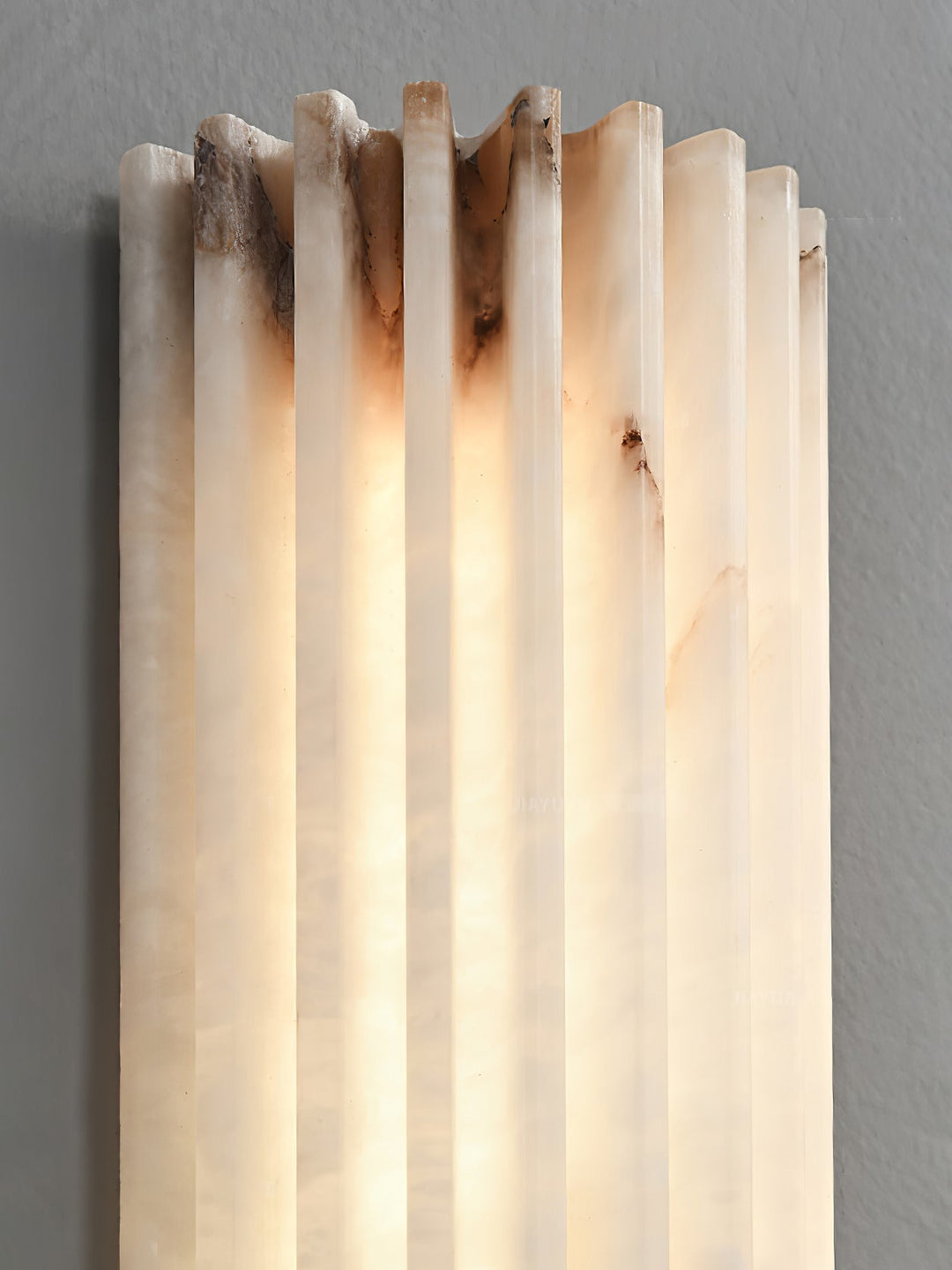Fluted alabaster wall light