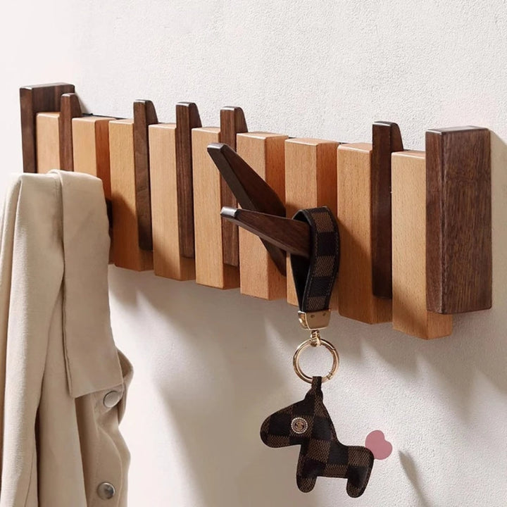 Folding piano key wooden coat rack