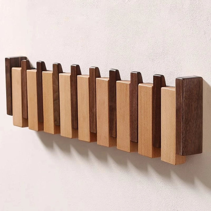 Folding piano key wooden coat rack