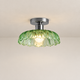 Green pressed-glass flush mount ceiling light with chrome plate