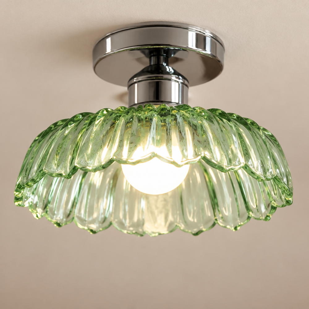 Close-up of the ribbed green glass shade and chrome collar
