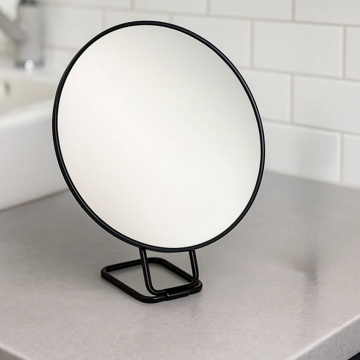 Magnifying make-up mirror with folding stand