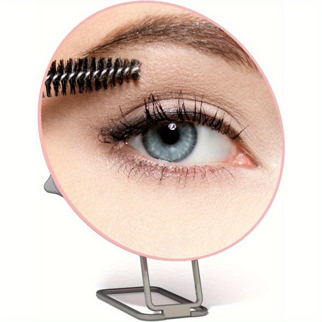 Magnifying make-up mirror with folding stand