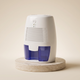 Petite dehumidifier on a travertine plinth