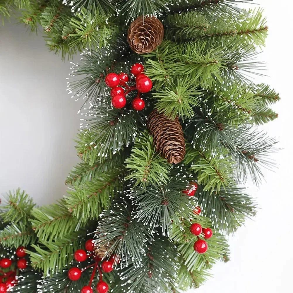 Pre-lit frosted pine Christmas wreath with berries and pine cones
