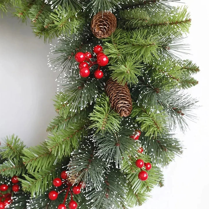 Pre-lit frosted pine Christmas wreath with berries and pine cones