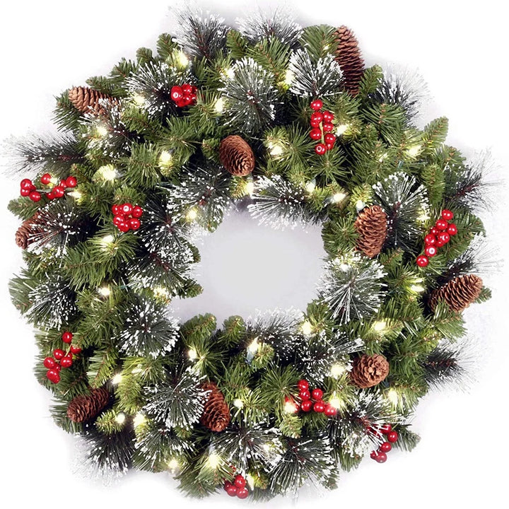 Pre-lit frosted pine Christmas wreath with berries and pine cones