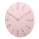 Silent wall clock with raised wire numerals
