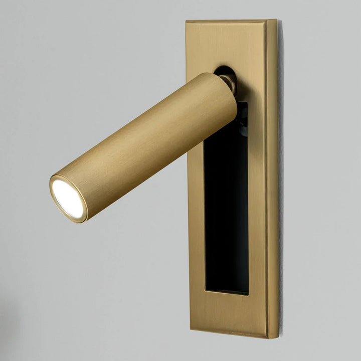 Swivel reading wall light