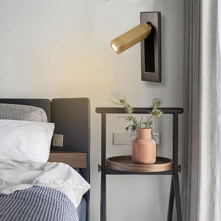 Swivel reading wall light