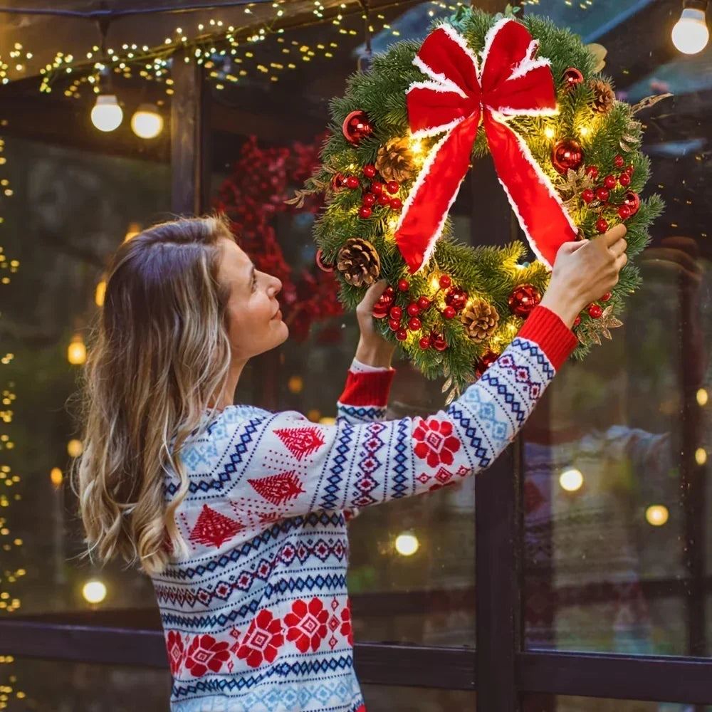 Christmas wreath with red velvet bow and baubles