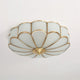 Scalloped brass and frosted glass ceiling light
