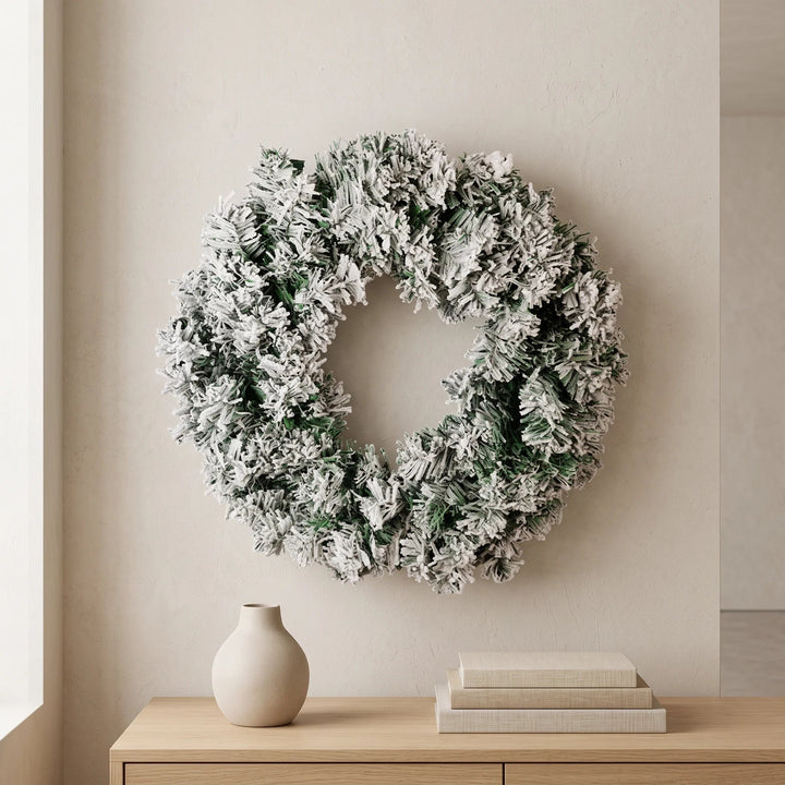 Snow-flocked pine Christmas wreath