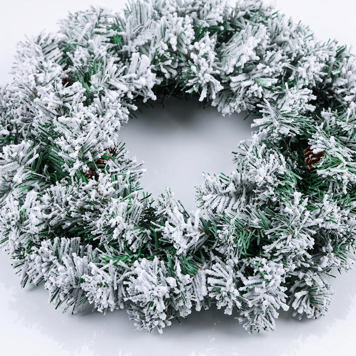 Snow-flocked pine Christmas wreath