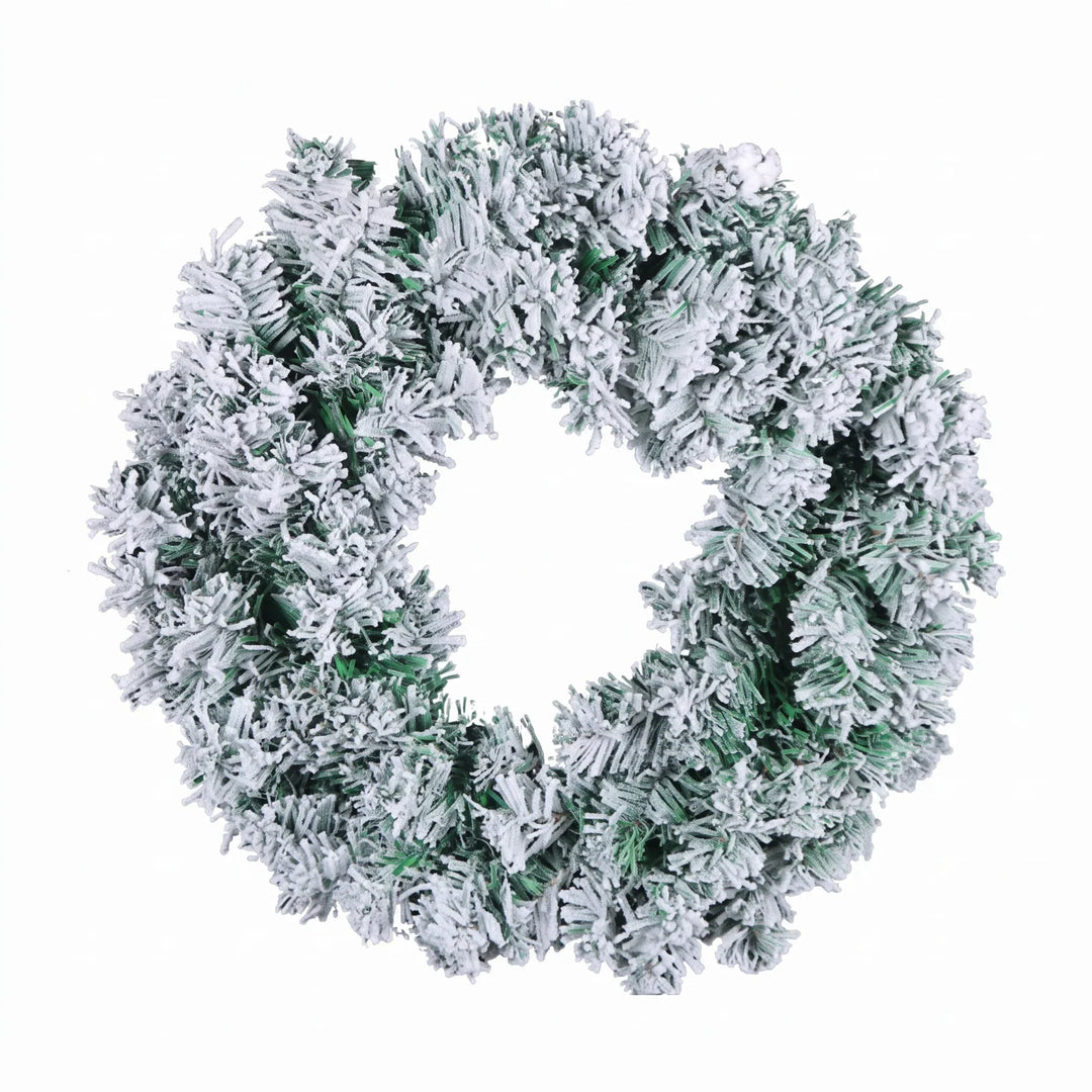 Snow-flocked pine Christmas wreath