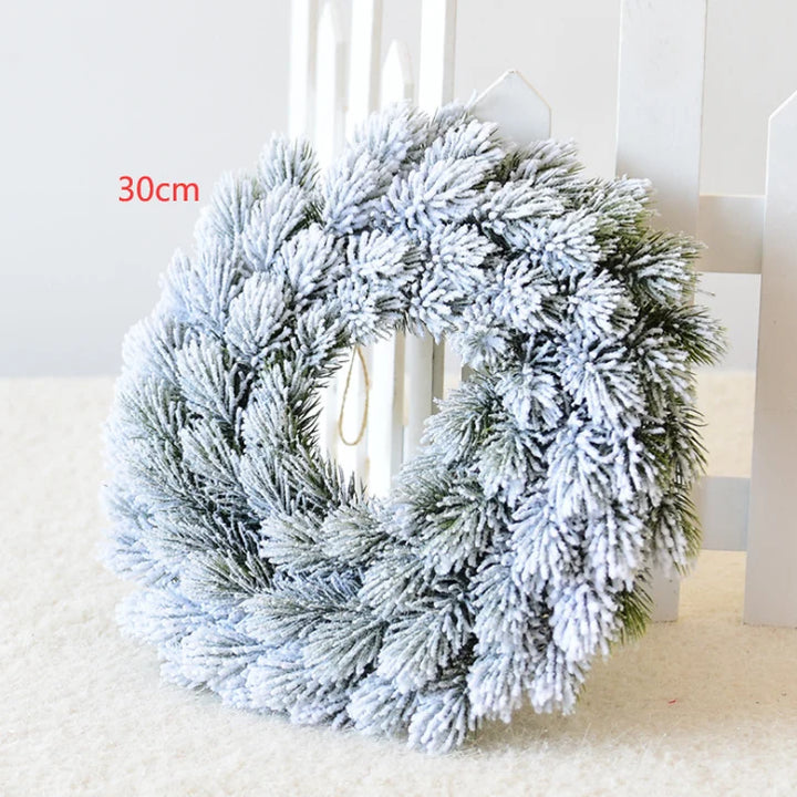 Snow-flocked pine Christmas wreath