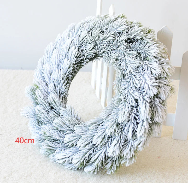 Snow-flocked pine Christmas wreath