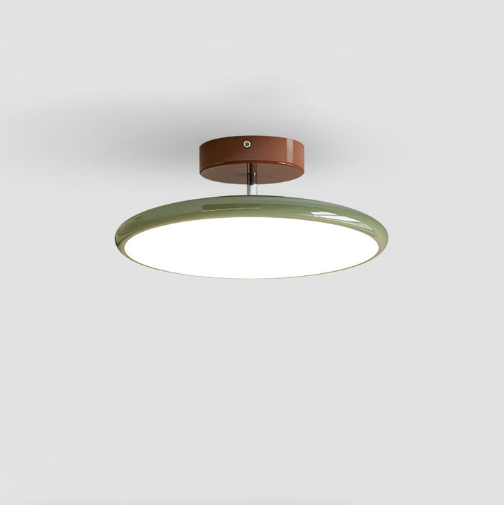 Tilting disc LED ceiling light