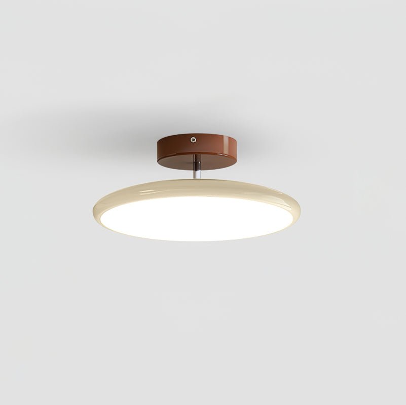 Tilting disc LED ceiling light