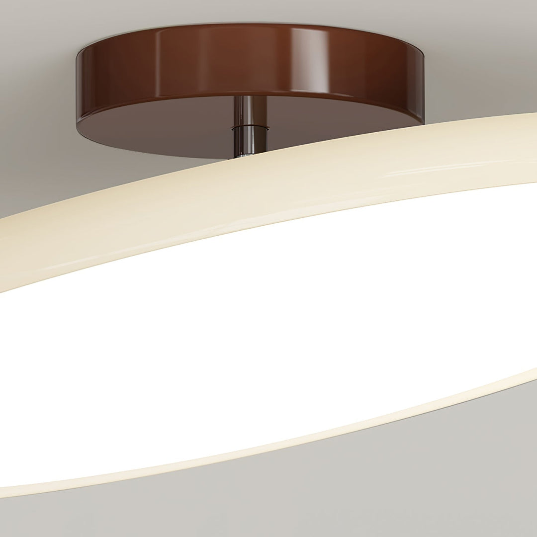 Tilting disc LED ceiling light