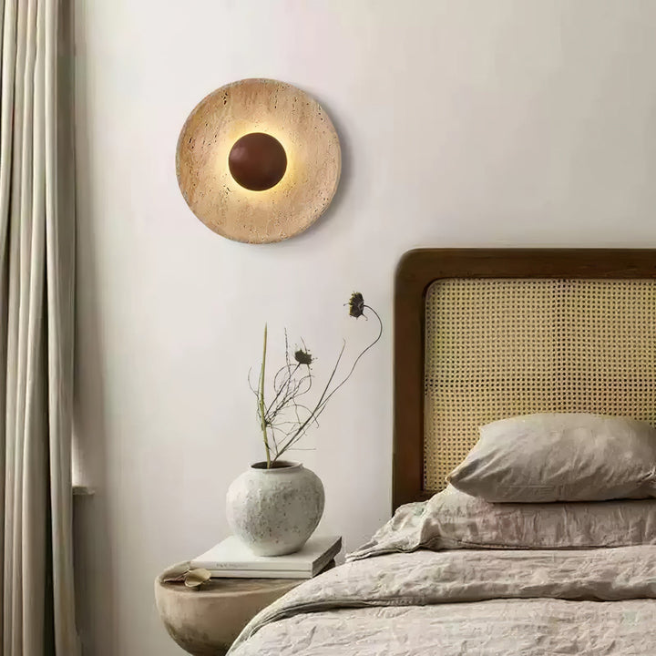 Travertine disc wall light