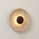 Travertine disc wall light