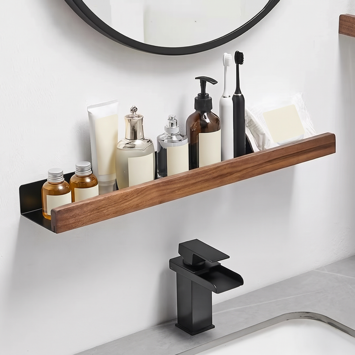 Walnut floating shelf above a basin