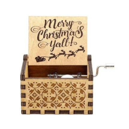 Wooden hand-crank Christmas music box